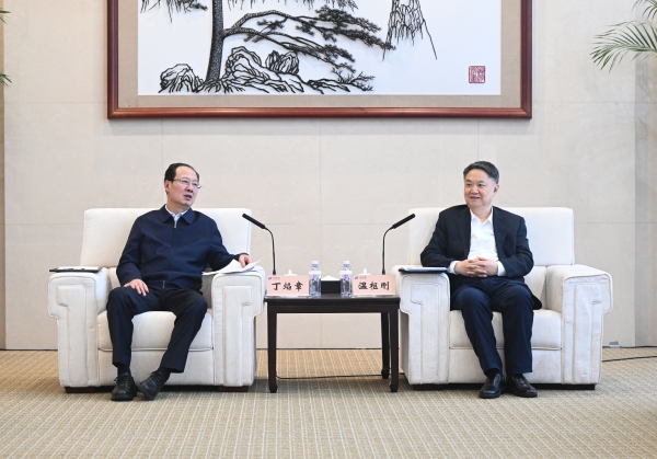 丁焰章與中國華能董事長、黨組書記溫樞剛會談